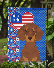 Load image into Gallery viewer, Chocolate and Tan Dachshund Patriotic Heart Garden Flag – Red, White &amp; Blue Dog Decor with Star Background