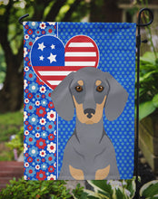 Load image into Gallery viewer, Blue and Tan Dachshund Patriotic Heart Garden Flag – Red, White &amp; Blue Dog Decor with Star Background