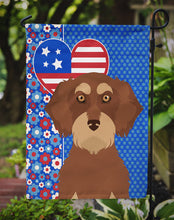 Load image into Gallery viewer, Wirehair Red and Tan Dachshund Patriotic Heart Garden Flag – Red, White &amp; Blue Dog Decor with Star Background