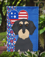 Load image into Gallery viewer, Wirehair Black and Cream Dachshund Patriotic Heart Garden Flag – Red, White &amp; Blue Dog Decor with Star Background