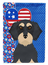 Load image into Gallery viewer, Wirehair Black and Cream Dachshund Patriotic Heart Garden Flag – Red, White &amp; Blue Dog Decor with Star Background