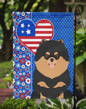 Load image into Gallery viewer, Black and Tan Pomeranian Patriotic Heart Garden Flag – Red, White &amp; Blue Dog Decor with Star Background