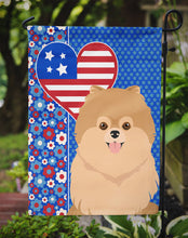 Load image into Gallery viewer, Orange Pomeranian Patriotic Heart Garden Flag – Red, White &amp; Blue Dog Decor with Star Background