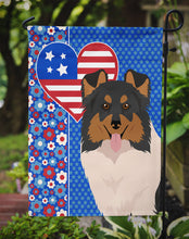 Load image into Gallery viewer, Tricolor Sheltie Patriotic Heart Garden Flag – Red, White &amp; Blue Dog Decor with Star Background