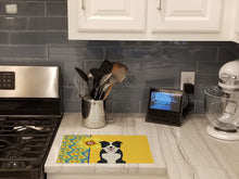 Load image into Gallery viewer, Summer Sunflowers Black and White Border Collie Glass Cutting Boards – Durable, Decorative Kitchen Art Large