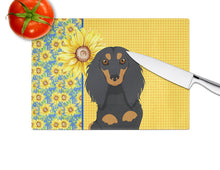 Load image into Gallery viewer, Summer Sunflowers Longhair Black and Tan Dachshund Glass Cutting Boards – Durable, Decorative Kitchen Art Large