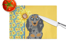Load image into Gallery viewer, Summer Sunflowers Longhair Blue and Tan Dapple Dachshund Glass Cutting Boards – Durable, Decorative Kitchen Art Large