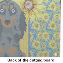 Load image into Gallery viewer, Summer Sunflowers Longhair Blue and Tan Dapple Dachshund Glass Cutting Boards – Durable, Decorative Kitchen Art Large