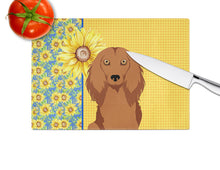 Load image into Gallery viewer, Summer Sunflowers Longhair Red Dachshund Glass Cutting Boards – Durable, Decorative Kitchen Art Large