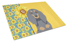 Load image into Gallery viewer, Summer Sunflowers Longhair Blue and Tan Dachshund Glass Cutting Boards – Durable, Decorative Kitchen Art Large