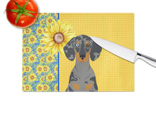 Load image into Gallery viewer, Summer Sunflowers Black Dapple Dachshund Glass Cutting Boards – Durable, Decorative Kitchen Art Large