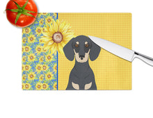 Load image into Gallery viewer, Summer Sunflowers Black and Cream Dachshund Glass Cutting Boards – Durable, Decorative Kitchen Art Large