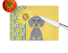 Load image into Gallery viewer, Summer Sunflowers Blue and Tan Dachshund Glass Cutting Boards – Durable, Decorative Kitchen Art Large