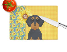 Load image into Gallery viewer, Summer Sunflowers Wirehair Black and Tan Dachshund Glass Cutting Boards – Durable, Decorative Kitchen Art Large