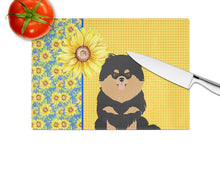 Load image into Gallery viewer, Summer Sunflowers Black and Tan Pomeranian Glass Cutting Boards – Durable, Decorative Kitchen Art Large