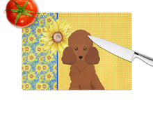 Load image into Gallery viewer, Summer Sunflowers Toy Red Poodle Glass Cutting Boards – Durable, Decorative Kitchen Art Large