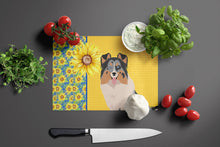 Load image into Gallery viewer, Summer Sunflowers Blue Merle Sheltie Glass Cutting Boards – Durable, Decorative Kitchen Art Large
