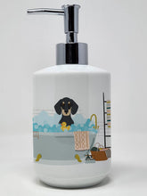 Load image into Gallery viewer, Black and Cream Dachshund Ceramic Soap Dispenser