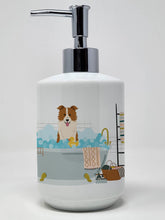 Load image into Gallery viewer, Red White Border Collie in Bathtub Ceramic Soap Dispenser