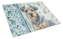 Load image into Gallery viewer, Blue and Tan Border Terrier Coastal Sea Glass Glass Cutting Board