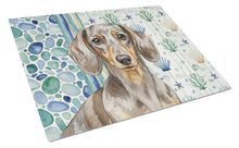 Load image into Gallery viewer, Dapple Dachshund Coastal Sea Glass Glass Cutting Board