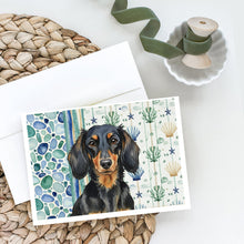 Load image into Gallery viewer, Longhaired Black and Tan Dachshund Coastal Sea Glass Greeting Cards Pack of 8