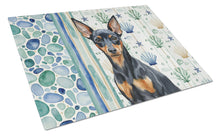 Load image into Gallery viewer, Black and Tan Miniature Pinscher Coastal Sea Glass Glass Cutting Board