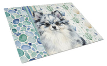Load image into Gallery viewer, Blue Merle Pomeranian Coastal Sea Glass Glass Cutting Board