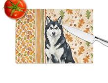 Load image into Gallery viewer, Black and White Alaskan Malamute Heirloom Fall Glass Cutting Board