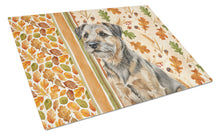 Load image into Gallery viewer, Grizzle and Tan Border Terrier Heirloom Fall Glass Cutting Board
