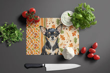 Load image into Gallery viewer, Black and Tan Chihuahua Heirloom Fall Glass Cutting Board