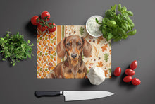 Load image into Gallery viewer, Chocolate and Tan Dachshund Heirloom Fall Glass Cutting Board
