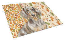 Load image into Gallery viewer, Dapple Dachshund Heirloom Fall Glass Cutting Board