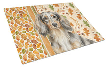 Load image into Gallery viewer, Longhaired Dapple Dachshund Heirloom Fall Glass Cutting Board
