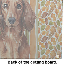 Load image into Gallery viewer, Longhaired Red Dachshund Heirloom Fall Glass Cutting Board