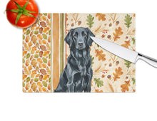Load image into Gallery viewer, Black Flat-Coated Retriever Heirloom Fall Glass Cutting Board