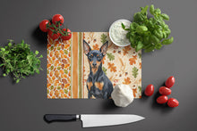 Load image into Gallery viewer, Black and Tan Miniature Pinscher Heirloom Fall Glass Cutting Board