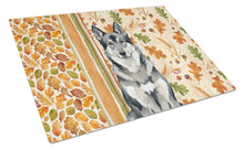 Load image into Gallery viewer, Norwegian Elkhound Heirloom Fall Glass Cutting Board