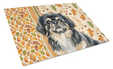 Load image into Gallery viewer, Black and Tan Pekingese Heirloom Fall Glass Cutting Board