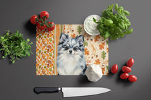 Load image into Gallery viewer, Blue Merle Pomeranian Heirloom Fall Glass Cutting Board