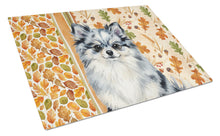 Load image into Gallery viewer, Blue Merle Pomeranian Heirloom Fall Glass Cutting Board