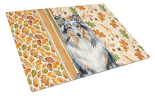 Load image into Gallery viewer, Blue Merle Sheltie Heirloom Fall Glass Cutting Board
