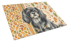 Load image into Gallery viewer, Black and Tan Tibetan Spaniel Heirloom Fall Glass Cutting Board