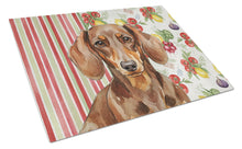 Load image into Gallery viewer, Chocolate and Tan Dachshund Vegetables Glass Cutting Board