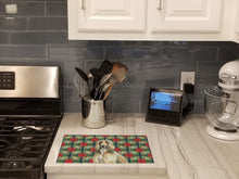 Load image into Gallery viewer, Afghan Hound Christmas PoinsettIas Glass Cutting Board