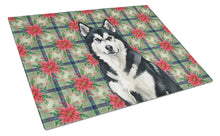 Load image into Gallery viewer, Black and White Alaskan Malamute Christmas PoinsettIas Glass Cutting Board