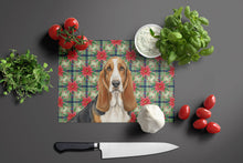 Load image into Gallery viewer, Tricolor and White Basset Hound Christmas PoinsettIas Glass Cutting Board
