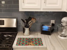 Load image into Gallery viewer, Mahogany Belgian Malinois Christmas PoinsettIas Glass Cutting Board