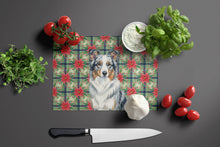 Load image into Gallery viewer, Blue Merle Border Collie Christmas PoinsettIas Glass Cutting Board