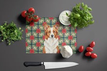 Load image into Gallery viewer, Red and White Border Collie Christmas PoinsettIas Glass Cutting Board